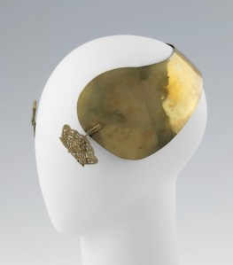 Brass ear iron, fourth quarter of the Nineteenth Century. Copyright the Metropolitan Museum of Art.